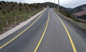 İlimtepe yoluna uzun ömürlü asfalt  ve sarı yol çizgisi